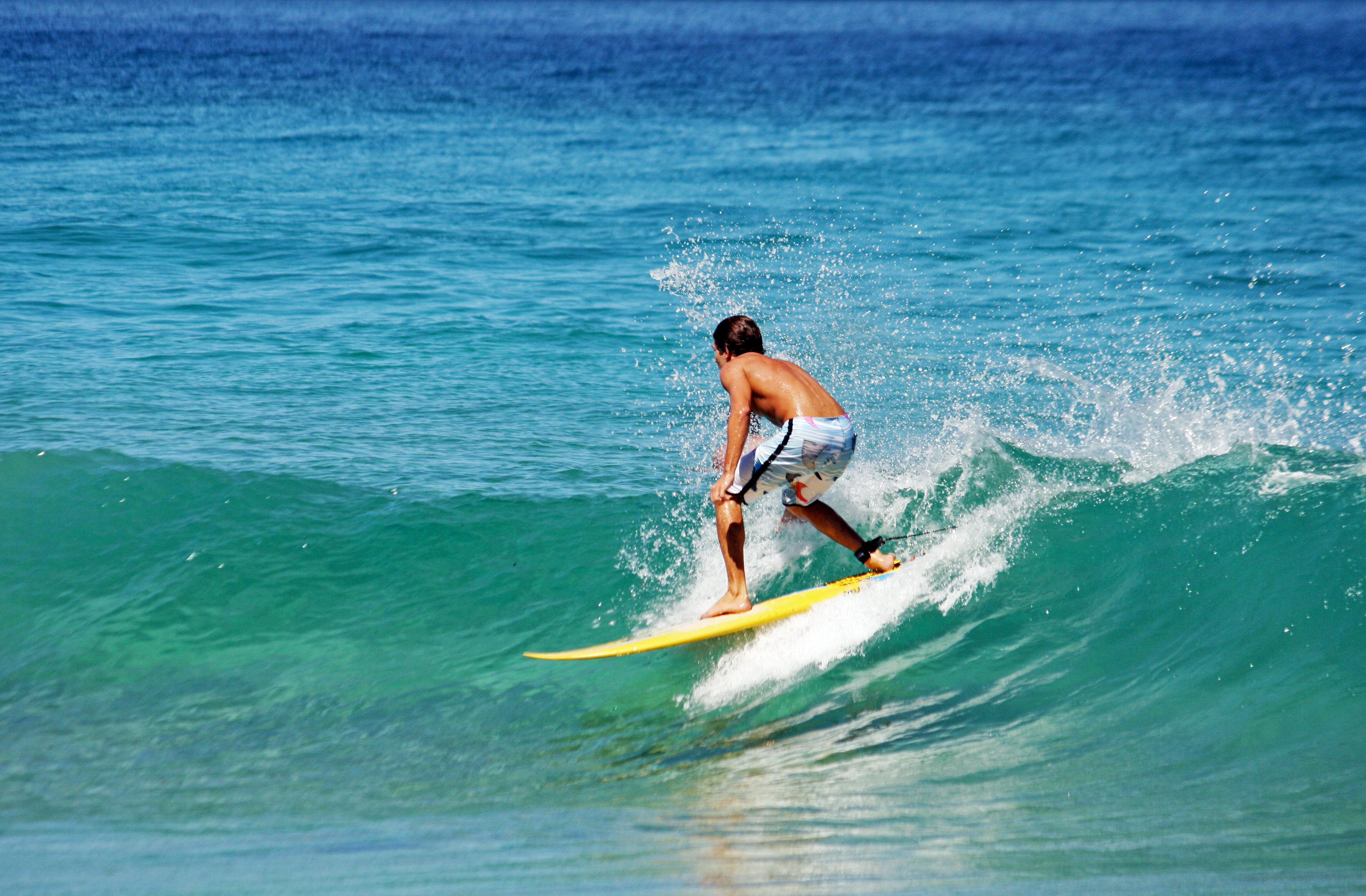 man surfing wave