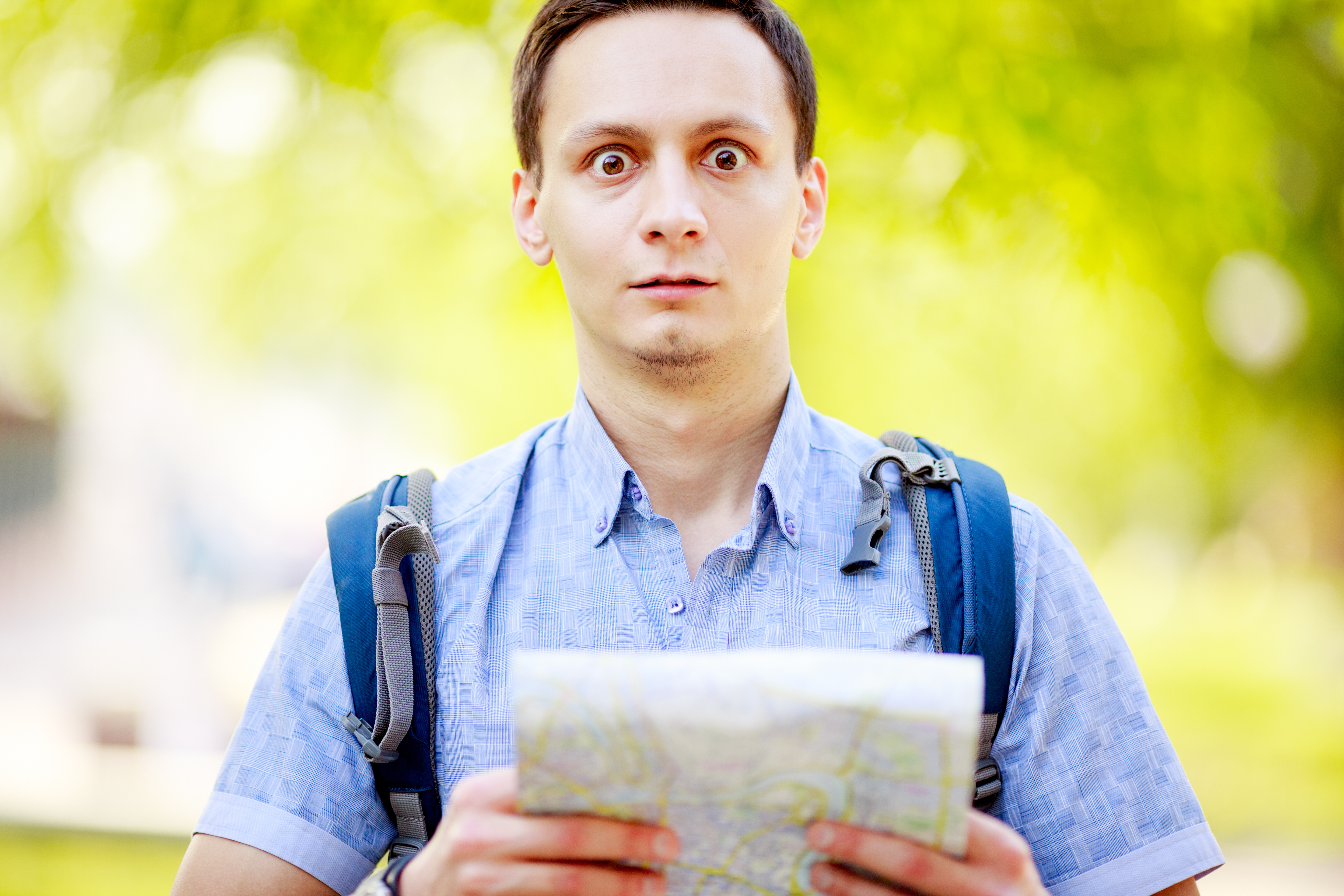 man debating a map