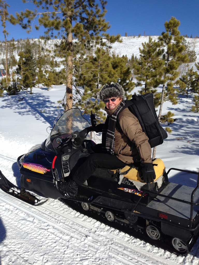 man on snowmobile